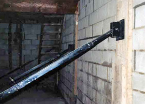 bowed basement wall supported with wall jack